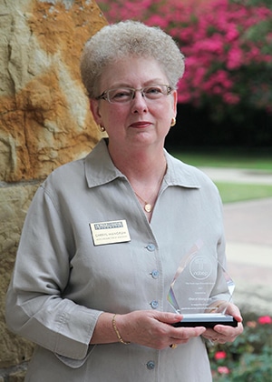 Cheryl Mangrum with NABEP award for web