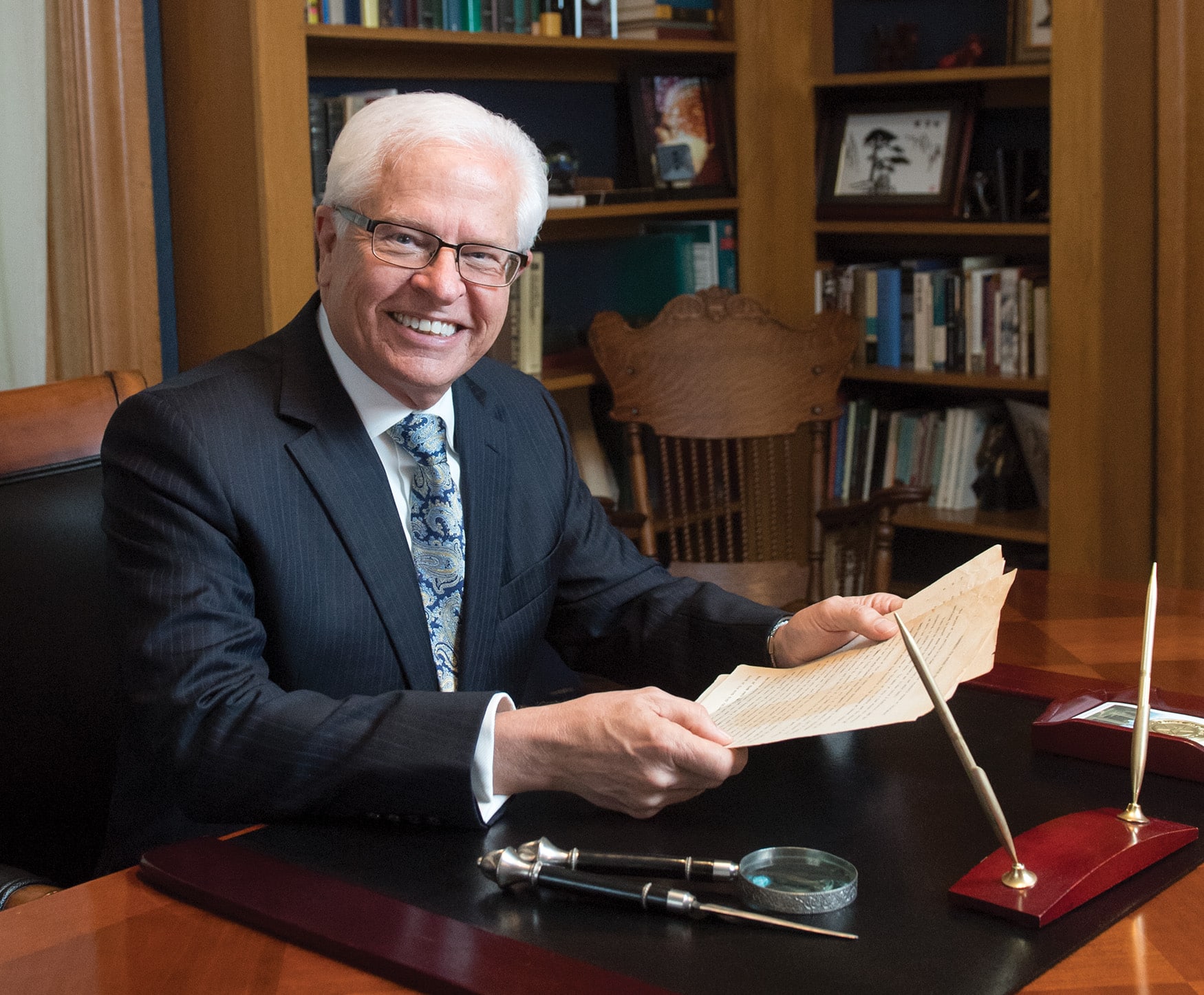 Dr. Bill Ellis at desk