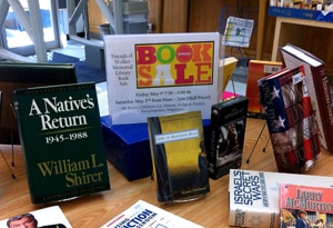 A variety of books displayed on a table for a book sale event at Howard Payne University. | HPU