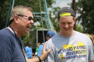 johnson_laughs_with_student_for_web