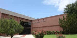 Exterior view of the Howard Payne University Davidson Music Complex building on a sunny day with clear skies. | HPU