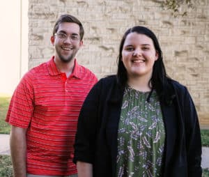 Two smiling individuals standing side by side outdoors at Howard Payne University. | HPU