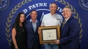 Scott Owen was named the recipient of HPU’s Outstanding Faculty Member Award. Pictured from left to right are Lisa Underwood and Leo Underwood, representing Underwood’s Cafeteria; Scott Owen; and Dr. Cory Hines, HPU president.