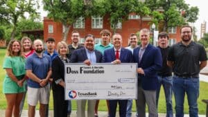 HPU students receiving the Doss Foundation Scholarship are pictured with representatives from HPU and TexasBank. From left to right are Addie Carroll; Bailee Bachtel; Travis Holleman; Zachary Hallman; Liz Brown, TexasBank executive vice president; Chase Churchwell; Tim Espinoza, TexasBank president, Brown County market; Jaxon Hermesmeyer; Dr. Cory Hines, HPU president; Zachary Ellis; Dr. Dale Meinecke, HPU vice president for advancement; Brady Furry; and Austin Gray.