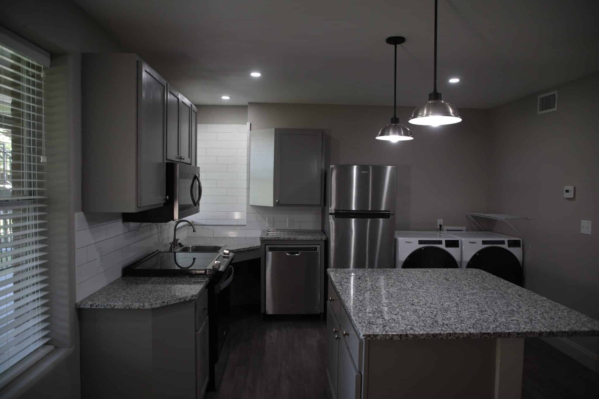 The kitchen area of one of the Newbury Apartments.